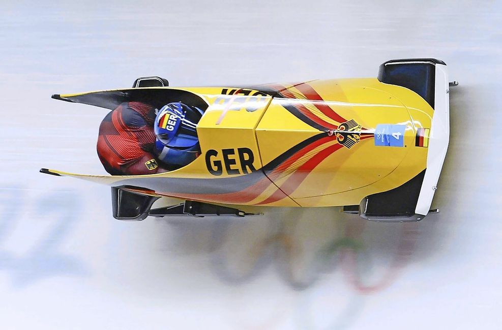 Francesco Friedrich lenkt den Zweierbob zu Gold.