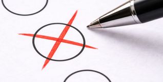 Ein Kreuzchen auf einem Stimmzettel.