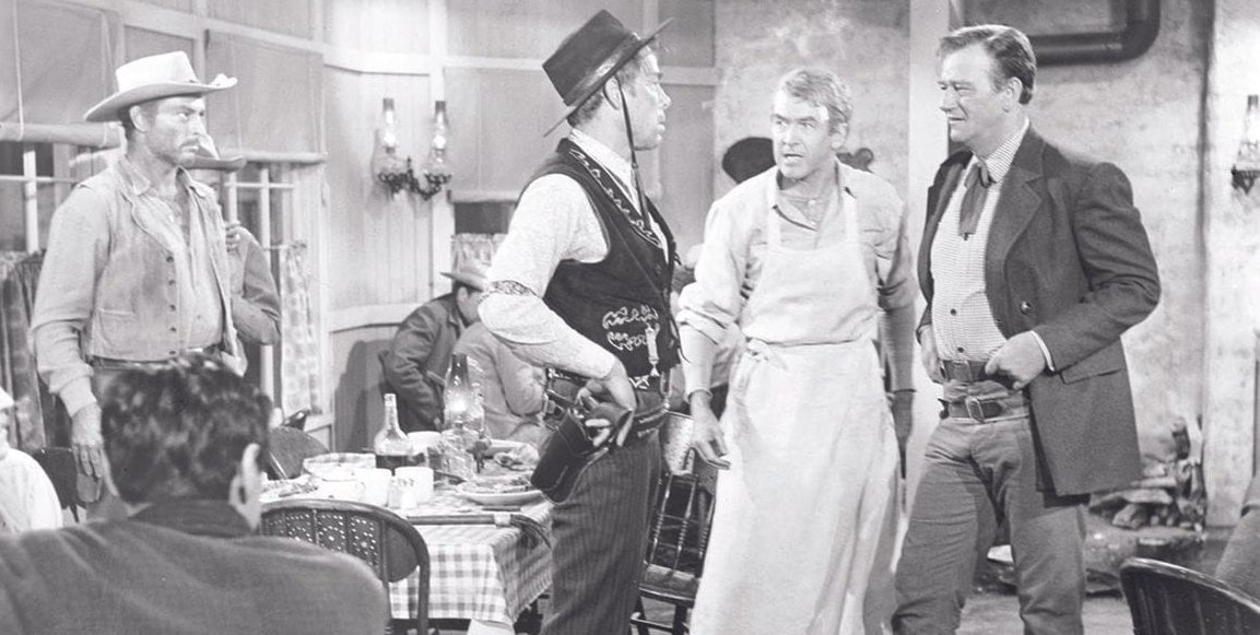 Von links: Lee van Cleef, Lee Marvin, James Stewart und John Wayne. Einer von ihnen ist "Der Mann der Liberty Valance erschoss" Und einer ist Liberty Valance.