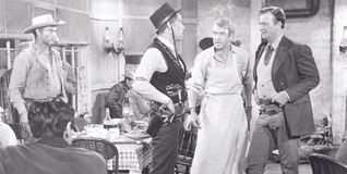 Von links: Lee van Cleef, Lee Marvin, James Stewart und John Wayne. Einer von ihnen ist "Der Mann der Liberty Valance erschoss" Und einer ist Liberty Valance.