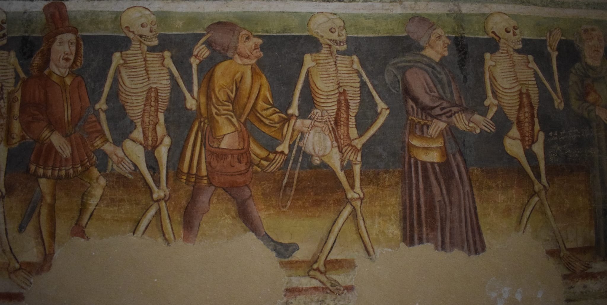 Der Totentanz in der Dreifaltigkeitskirche von Hrastovlje in Slowenien erinnert daran, dass der Tod keinen Unterschied zwischen Arm und Reich, Jung und Alt macht.