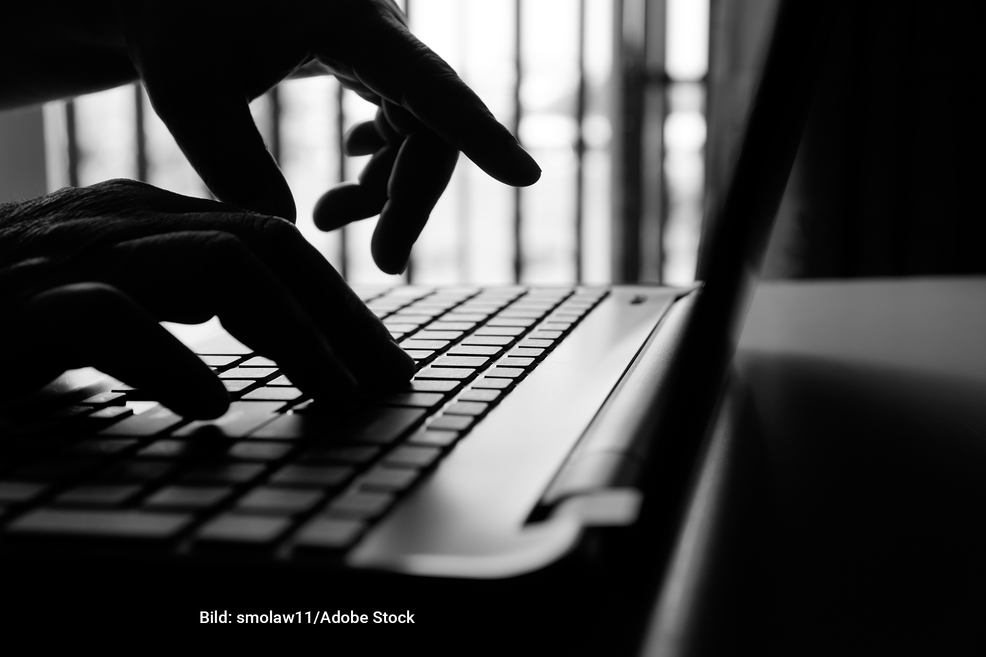 hacker or cyber crime hand reaching, stealing information on laptop, attack signifying internet theft while using online banking, anonymous business in technology internet and networking concept