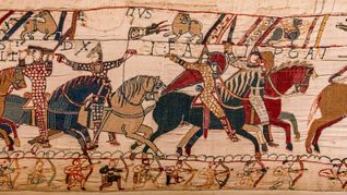 Der Teppich von Bayeux ist eine in der zweiten Hälfte des 11. Jahrhunderts entstandene Stickarbeit auf einem rund 52 Zentimeter hohen Tuchstreifen. In  Bild und Text wird auf 68 Metern in 58 Einzelszenen die  Eroberung Englands durch den Normannenherzog Wilhelm den Eroberer geschildert.