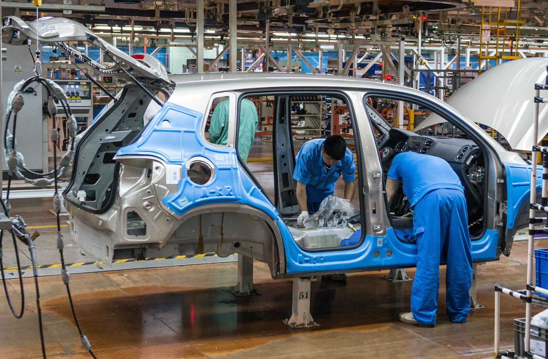 Die Produktion bei VW in Shanghai läuft – wie auch bei anderen deutschen Firmen.

Foto: dpa/Ole Spata