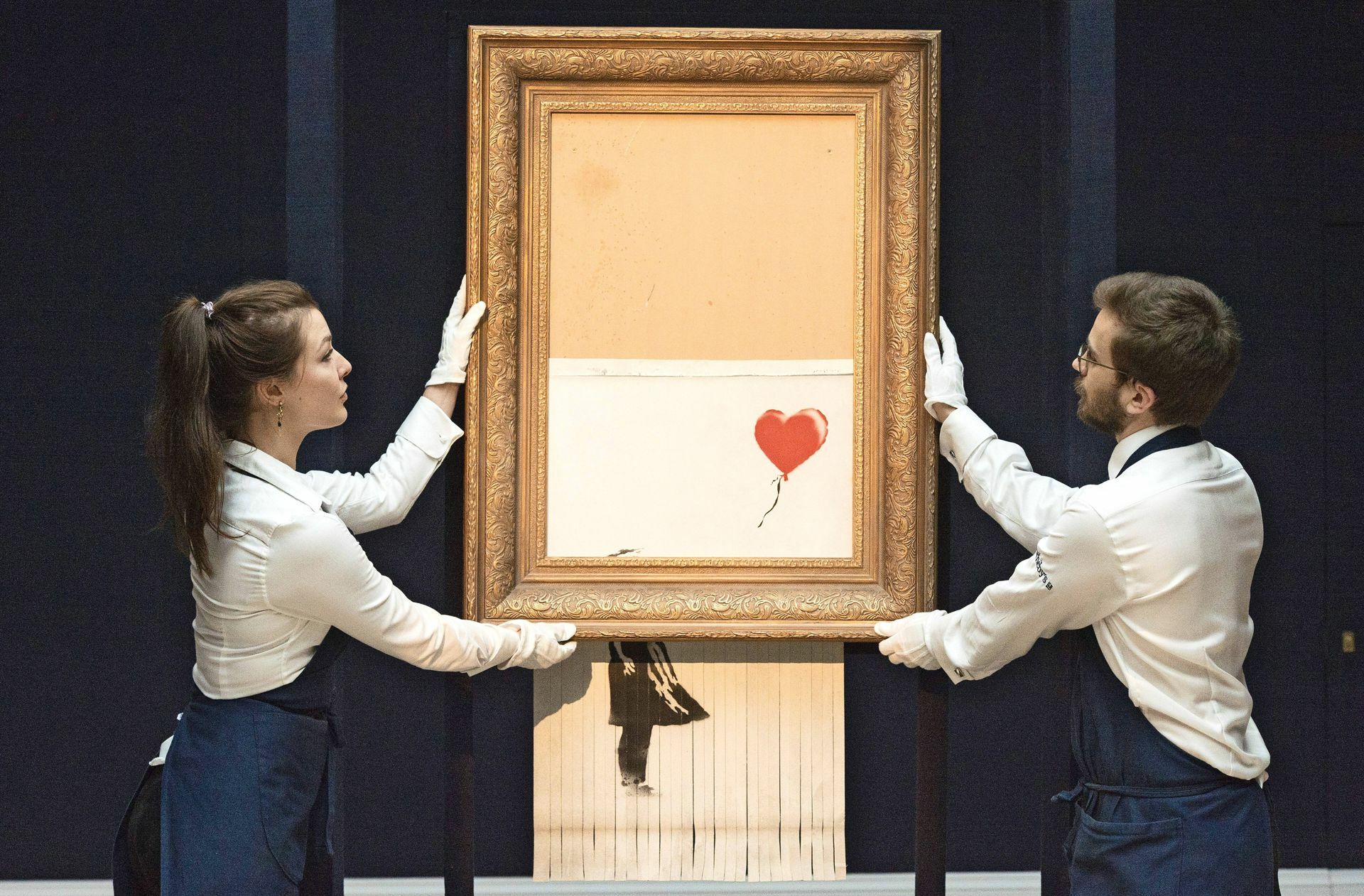 Geschreddert – und doch Kunst. Banksy macht es möglich
 Foto: imago/Xinhua/Ray Tang