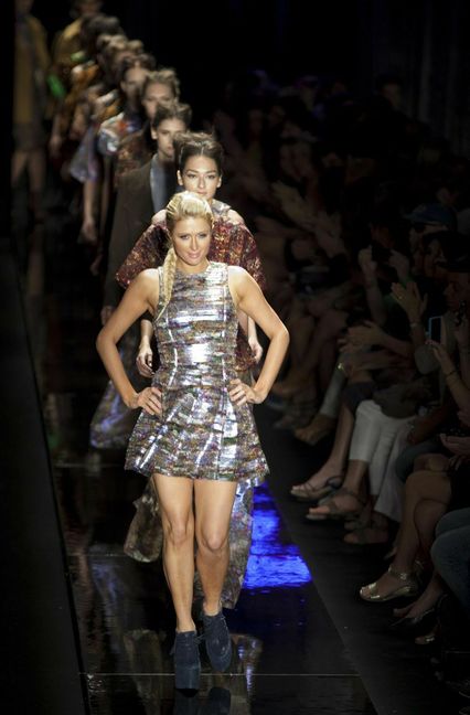 Ob als Autorin, Schauspielerin oder Model, wie hier 2011 bei der Sao Paulo Fashion Week: Paris Hilton war gefragt... Foto: dpa/Sebastião Moreira