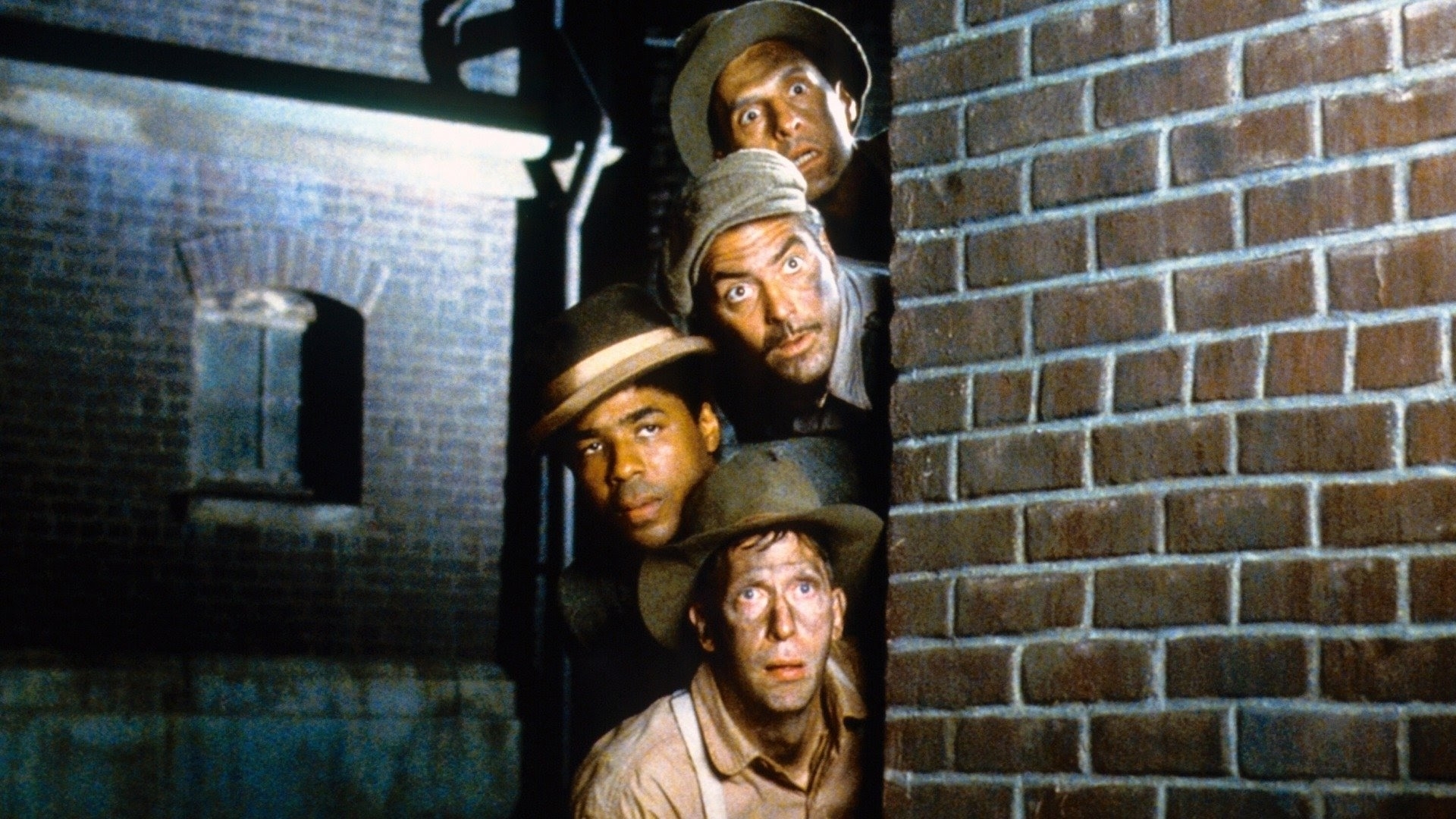George Clooney (Zweiter von oben) und seine Kumpels auf der Flucht in „O Brother, Where Art Thou?“   Bild: z