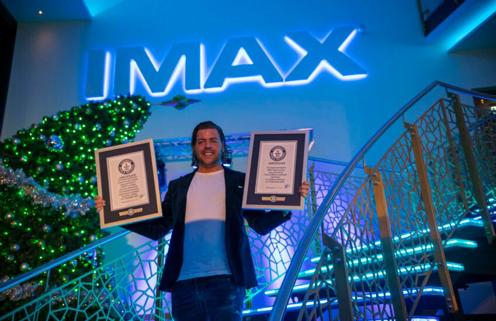 Kinobetreiber Marius Lochmann über die Auszeichnungen: „Wir haben die Leinwand und damit zwei Guinness World Records zwar zu uns geholt, doch die Ehre gebührt nicht uns allein. Ohne unsere fabelhaften Mitarbeiter und unsere treuen Besucher über all die Jahre an allen Standorten hätten wir nicht die Möglichkeit gehabt, unsere Vision umzusetzen. Wir freuen uns auf die nächsten 100 Jahre mit dem besten Publikum der Welt.“  Bild: z