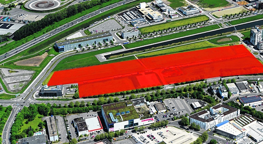 Auf dieser roten Fläche wird das Kreisklinikum gebaut. Luftbild: Stampe/A