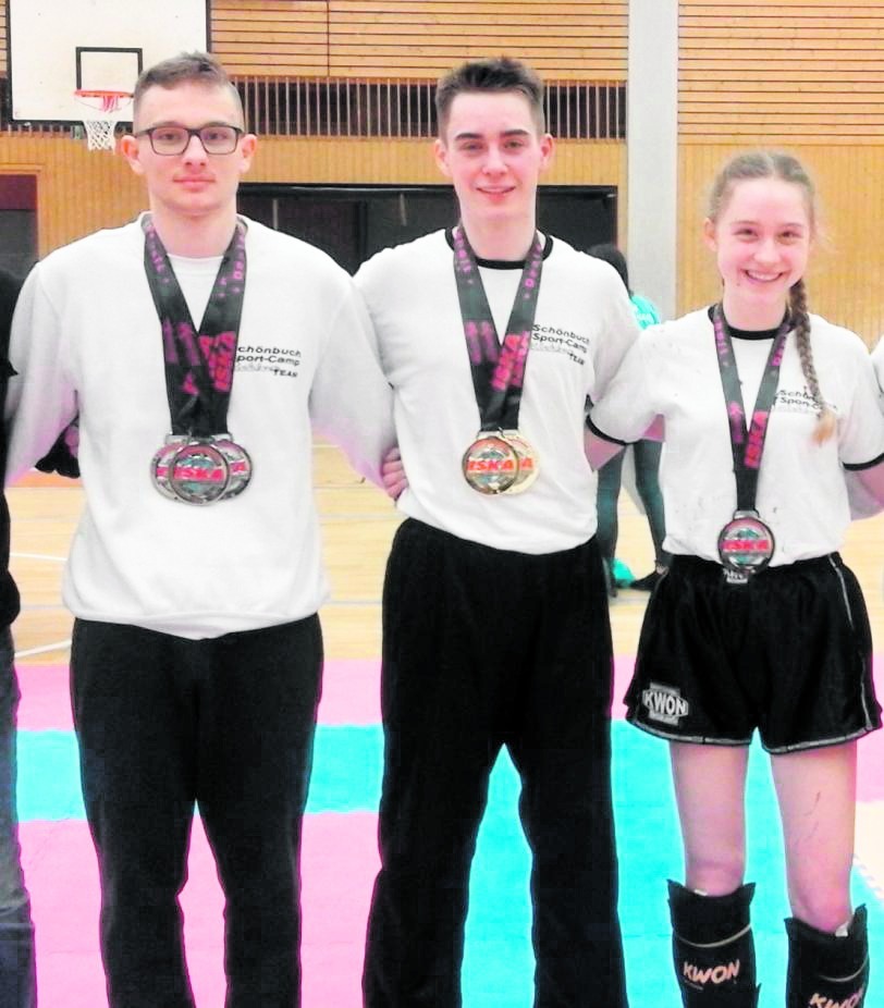 Starkes Trio holt sechs Medaillen: Mark Larsow, Nick Schimpf und Annabelle Heimerdinger (von links). Bild: z